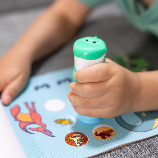 Melissa & Doug Sticker Wow!™ Dinosaur Bundle: 24-Page Activity Book, Refillable Sticker Stamper, Mini Pad, 500 Stickers, Arts and Crafts for Kids Ages 3+